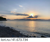 Beautiful sunset at the seaside, Greece. Редакционное фото, фотограф Екатерина Каляева / Фотобанк Лори