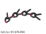 Пластмассовые зажимы на белом фоне. C clamps on white background. Стоковое фото, фотограф Татьяна Д / Фотобанк Лори