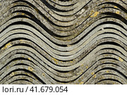 Corrugated slate lies in a pile, side view background texture of slate. Стоковое фото, фотограф Леонид Еремейчук / Фотобанк Лори