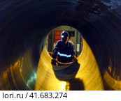 Safety at work. Welding and installation of the pipeline. Industrial weekdays welders and fitters. Стоковое фото, фотограф Леонид Еремейчук / Фотобанк Лори