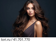 Portrait of a beautiful brunette with long wavy hair on a dark background. Generated by AI. Стоковое AI-изображение, AI-художник Ярославский Максим / Фотобанк Лори