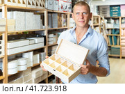 Man with sundries storage box. Стоковое фото, фотограф Яков Филимонов / Фотобанк Лори