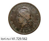 Obverse of Argentina old coin 2 centavos 1884, isolated in white background. Close up view. Аверс монеты 2 сентаво 1884, Аргентина, белый фон. Стоковое фото, фотограф Александр Кузнецов / Фотобанк Лори
