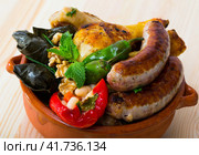 Kapama a dish of bulgarian cuisine with assortiment meat, grape rolls. Стоковое фото, фотограф Яков Филимонов / Фотобанк Лори