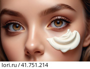 Close up portrait of beautiful young woman lying on bed with white cosmetic rejuvenating mask applied to skin of her face. Pretty brown hairs girl in white robe does spa treatments in beauty salon. AI. Стоковое AI-изображение, AI-художник Sergey Grishin / Фотобанк Лори