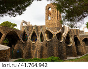Exterior view of guell crypt, masterpiece gaudi architecture located at catalunya outside town. Стоковое фото, фотограф Яков Филимонов / Фотобанк Лори