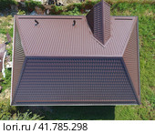 A view from above on the roof of the house. The roof of corrugated sheet. Roofing of metal profile wavy shape. Стоковое фото, фотограф Леонид Еремейчук / Фотобанк Лори