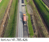 Top view of the road repair. Technics for repair of asphalt. Replacement of asphalt pavement. Стоковое фото, фотограф Леонид Еремейчук / Фотобанк Лори