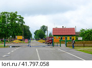 Контрольно-пропускной пункт Полесского государственного радиационно-экологического заповедника в отселённой деревне Бабчин в зоне отчуждения Чернобыльской АЭС, Беларусь (2020 год). Редакционное фото, фотограф Ольга Коцюба / Фотобанк Лори