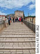 Mostar, Bosnia and Herzegovina - 03 May 2018: Stari Most - the old bridge in Mostar, Bosnia and Herzegovina. Редакционное фото, фотограф Сергей Стрелков / Фотобанк Лори