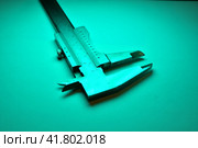 caliper mesure equipment scale engeneering micrometer precision blue light. Стоковое фото, фотограф Andreas Muth-Hegener / Фотобанк Лори