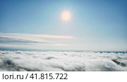Harmony Heights, The Calm Expanse of Billowing Cloud Formations. Aerial Drone Shot. Стоковое видео, видеограф Даниил Хабаров / Фотобанк Лори