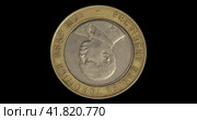 Монета Кении 10 шиллингов, аверс на черном фоне. Obverse of Kenya coin 10 shillings 1997, isolated in white background. Close up view. Стоковая анимация, аниматор Александр Кузнецов / Фотобанк Лори