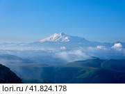 Elbrus at sunrise, fog and clouds in the foreground. Gum-Bashi Pass, North Caucasus, Russia. Стоковое фото, фотограф Владимир Глинский / Фотобанк Лори