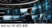 Talented Young male Professional Working in a Technological Research and Development Agency. Computer Screens with Software Code and Technical Neural Network Diagrams. Multiscreen set up. AI. Стоковое AI-изображение, AI-художник Sergey Grishin / Фотобанк Лори