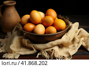 Chicken eggs on burlap, rustic still life  Generative AI. Стоковое AI-изображение, AI-художник Анна Кривицкая / Фотобанк Лори