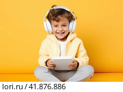 Children with gadgets, Alpha generation, Digital Aborigines - people born after the digital revolution and accustomed to gadgets from an early age. Стоковое AI-изображение, AI-художник Ирина Ручушкина / Фотобанк Лори