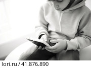 Children with gadgets, Alpha generation, Digital Aborigines - people born after the digital revolution and accustomed to gadgets from an early age. Стоковое AI-изображение, AI-художник Ирина Ручушкина / Фотобанк Лори