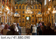 Russia Samara June 25, 2011: Orthodox parishioners came to baptize their babies in the church. Редакционное фото, фотограф Акиньшин Владимир / Фотобанк Лори