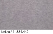 Soft Knitted Woolen Detailed Texture. Natural Fabric Closeup Knit Pattern. Gray Knitwear, Warm Cashmere Surface. Rotation, Macro. Cozy Textile Background. Clothes Production. Melange Yarn. 4K Shot. Стоковое видео, видеограф Марина Демидюк / Фотобанк Лори
