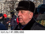 Председатель комитета Госдумы РФ по развитию Дальнего Востока и Арктики Николай Харитонов во время митинга сторонников партии КПРФ в городе Москве, Россия (2023 год). Редакционное фото, фотограф Николай Винокуров / Фотобанк Лори