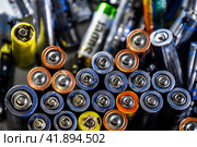 Salt and alkaline batteries, a source of energy for portable technology. AAA and AA batteries. Стоковое фото, фотограф Леонид Еремейчук / Фотобанк Лори