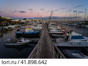 PLAYA BLANCA, LANZAROTE - OCTOBER 25, 2023: Evening on Marina Rubicon of Playa Blanca. Playa Blanca is the southernmost town of the Spanish island of Lanzarote. It is the newest resort on the island. Редакционное фото, фотограф Sergey Kohl / Фотобанк Лори