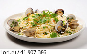 Spaghetti alle vongole with tomato in seafood jus served as close-up at a Nordic design bowl with copy space. Стоковое AI-изображение, AI-художник Ирина Ручушкина / Фотобанк Лори