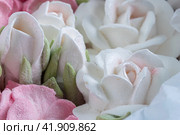 Zephyr bouquet of flowers in a gift box on a light background. Zephyr with a minimum amount of sugar. a natural product. Стоковое фото, фотограф Ирина Ручушкина / Фотобанк Лори
