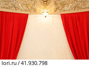 Red curtains around the edges on the background of wallpaper. Стоковое фото, фотограф Aleksandra Selivanova / Фотобанк Лори