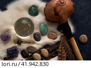 handmade stone runes on white fur. Стоковое фото, фотограф Boris Vasilenko / Фотобанк Лори