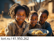 The problem of poverty and inequality. Happy african kids eating some sorghum porridge in village outdoor. Стоковое AI-изображение, AI-художник Ирина Михайличенко / Фотобанк Лори