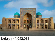 Islamic Educational and Spiritual-educational building of the Miri Arab Madrasah on a sunny day, Bukhara, Uzbekistan. Стоковое фото, фотограф Ula Ulachka / Фотобанк Лори