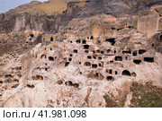 Vardzia cave monastery structures carved into mountain. Стоковое фото, фотограф Яков Филимонов / Фотобанк Лори