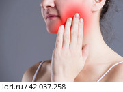 Woman with toothache, teeth pain closeup. Стоковое фото, фотограф Станислав Тарко / Фотобанк Лори