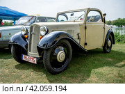 WERDER (HAVEL), GERMANY - MAY 20, 2023: The sub compact car DKW F5 K Reichsklasse, 1936. Oldtimer - Festival Werder Classics 2023. Редакционное фото, фотограф Sergey Kohl / Фотобанк Лори