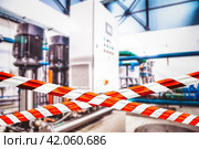 Unsafe industrial room from barrier red white lines, danger zone, do not enter. Barrier warning cross types on closed industry area indoors. Production shutdown concept, no open. Copy ad text space. Стоковая иллюстрация, иллюстратор Aleksandr Golubev / Фотобанк Лори