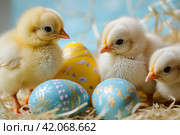 three small yellow chicks are sitting by some colorful easter eggs. Стоковое AI-изображение, AI-художник Юлия Гапеенко / Фотобанк Лори