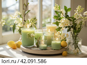 A display of scented candles in spring-inspired fragrances, arranged with botanical elements and soft lighting. Стоковое AI-изображение, AI-художник Юлия Гапеенко / Фотобанк Лори