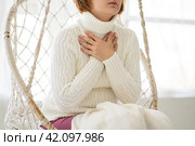 Sore throat and cough, woman with pain in neck at home. Стоковое фото, фотограф Станислав Тарко / Фотобанк Лори