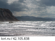 Fantastic picturesque seascape of Itzurun beach in Zumaia in Basque Autonomous Community  country in summer day. Concept of the beauty in nature. Noise of the ocean in the image. Стоковое фото, фотограф YuryKara / Фотобанк Лори