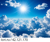 Panorama cloudscape of blue sky with fluffy clouds sunlight on clean background, cozy wallpaper. Beauty clear cloudy in sunshine atmospheric backdrop. Design backgrounds concept. Copy ad text space. Стоковое AI-изображение, AI-художник Aleksandr Golubev / Фотобанк Лори
