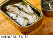 Open can of sardines in oil. Стоковое фото, фотограф Яков Филимонов / Фотобанк Лори