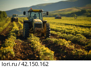 Tractor cultivating field at spring. sprawling agricultural farm with fields of crops, tractors, and machinery involved in food production for a growing population. Стоковое AI-изображение, AI-художник Ирина Михайличенко / Фотобанк Лори