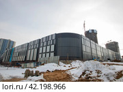 Belarus, Minsk - 07 february, 2024: Modern houses in Minsk world. Редакционное фото, фотограф Аксенова Вера / Фотобанк Лори
