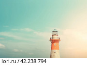 Lighthouse sunrise background. Generate Ai. Стоковое AI-изображение, AI-художник Иван Рябоконь / Фотобанк Лори