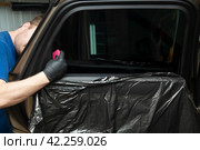 Tinting of car windows.Window film for car. Стоковое фото, фотограф Александр Поташев / Фотобанк Лори