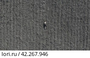 Top down view on gril lying on the ground. Стоковое видео, видеограф Александр Кузовков / Фотобанк Лори