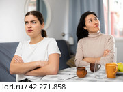 Two silent upset kopeck piece sitting during a domestic quarrel. Стоковое фото, фотограф Яков Филимонов / Фотобанк Лори