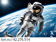Astronaut on a spacewalk against earth backdrop. Space explorer in a white suit hovers above earth, capturing the vastness of space. Стоковое AI-изображение, AI-художник Aleksandr Golubev / Фотобанк Лори